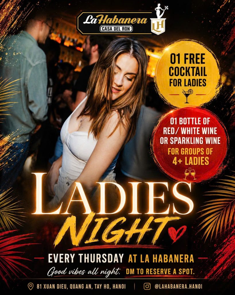 Woman dancing at La Habanera Ladies Night promotion in Hanoi with free cocktail and wine offers for women every Thursday.